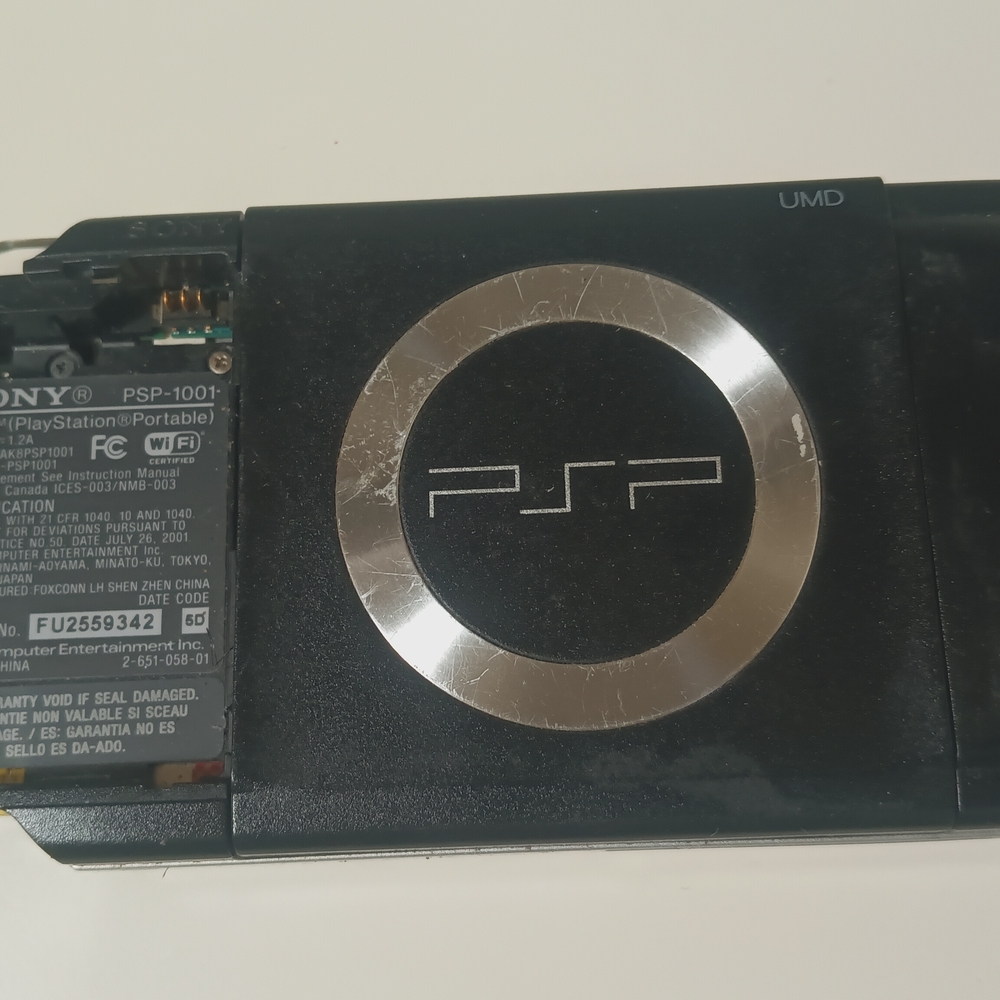 Sony Black Handheld Console with Distinctive Silver Logo